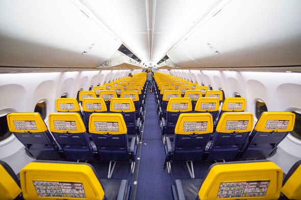 Ryanair seats with safety card stuck on the back of the headrest and no seat-back pockets